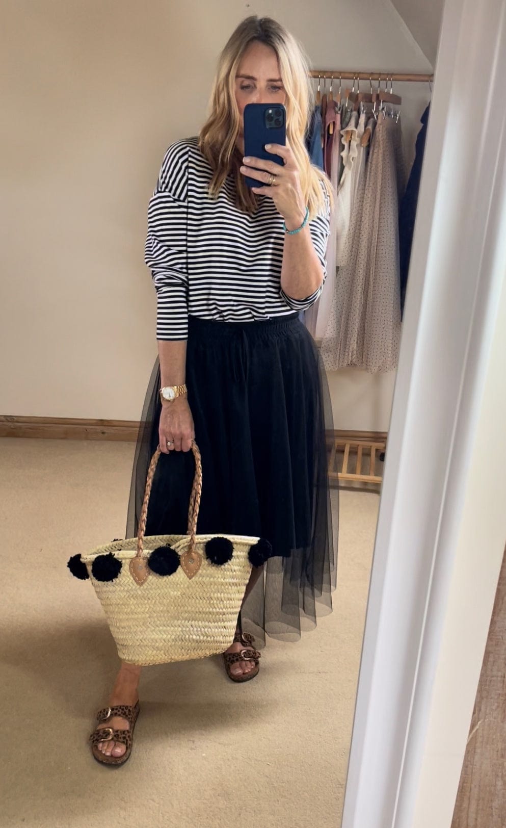 Straw basket with black Pom Poms